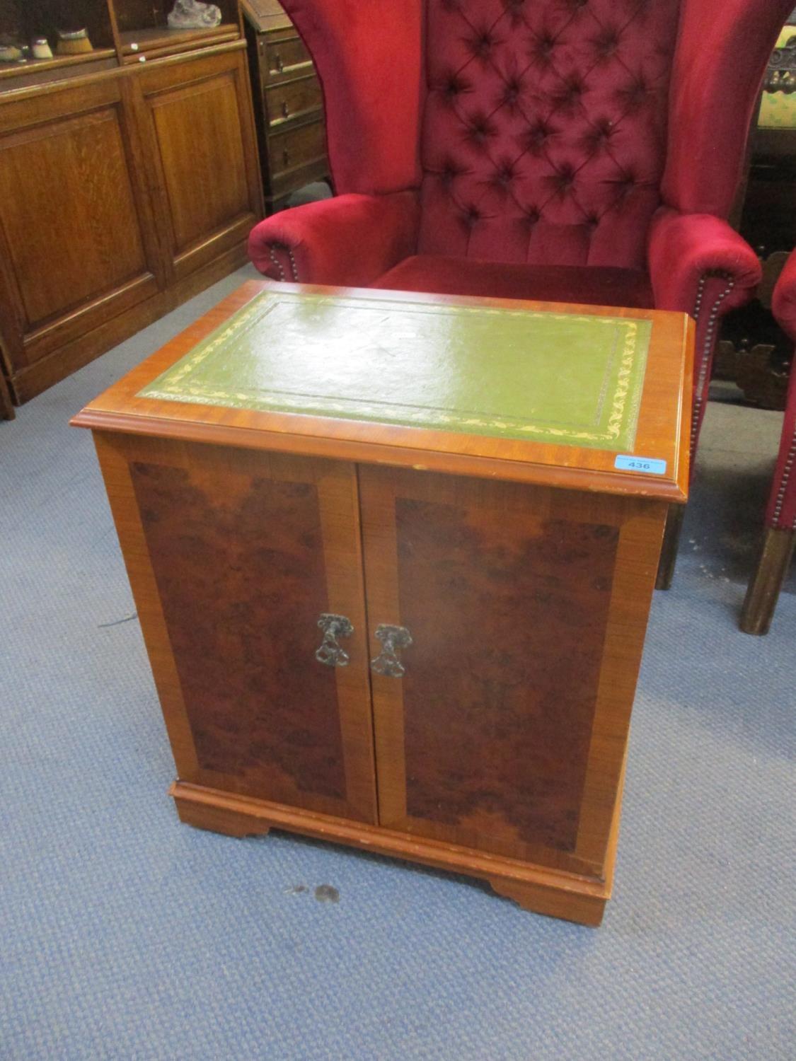 A reproduction yew cabinet with a green leather scriber Location: ROS