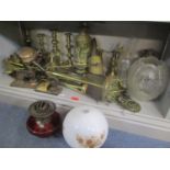 A mixed lot to include brass fire implements, brass candlesticks, oil lamp with shade, two Victorian