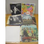 A large collection of collectable Beatles LPs, some never played and in good condition