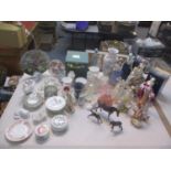 A mixed lot to include Beswick Horses, a Coalport figure of a Lady, Wedgewood Humming Bird models,