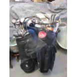 A ladies full set of golf clubs to include Yonex and various other clubs and bags