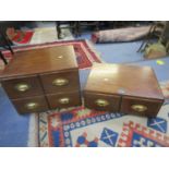 An early 20th century oak four drawer table cabinet with brass handles and a matching two drawer