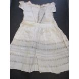 A collection of cotton and lace childrens dresses, 19th century and early 20th century, together