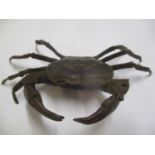 A reproduction Japanese bronze ornament of a crab, 3.2cm h x 12.5cm w