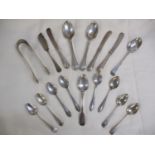 A quantity of silver cutlery and flatware comprising nine teaspoons, a fish knife, three butter