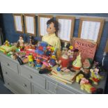 A large quantity of vintage children's toys to include a large doll, children's books to include