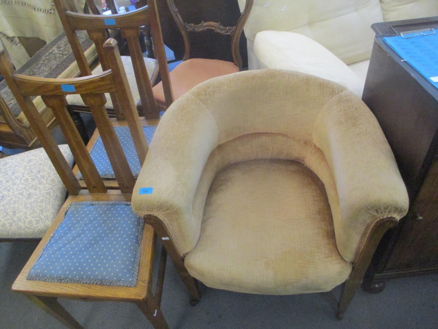 An Edwardian tub chair, together with a pair of oak Arts & Crafts chairs