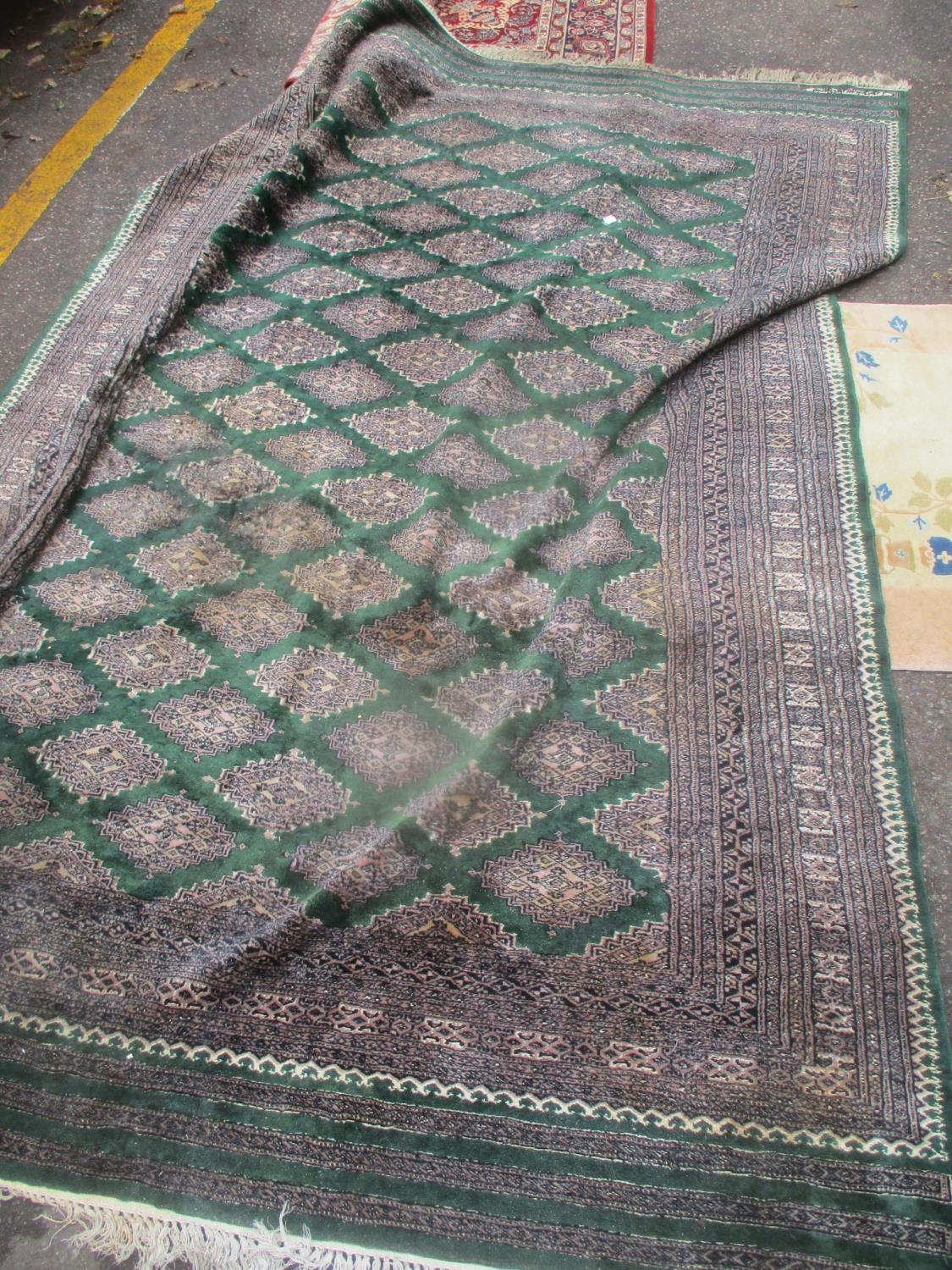 Mixed rugs to include a Pakistan green ground rug having multiguard borders and geometric design - Image 2 of 2