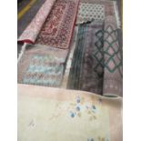 Mixed rugs to include a Pakistan green ground rug having multiguard borders and geometric design