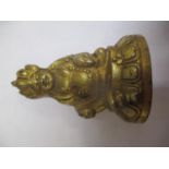 A reproduction small gilt metal Kuber figure, 6cm h x 4cm w