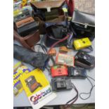 Vintage photographic equipment to include a Polaroid Sun 600, a Polaroid One Stepp 600, a Brownie