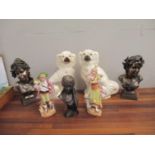 A pair of Victorian Staffordshire model dogs, two continental porcelain figures, a pair of