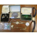 Watches to include a gold cased example, a 9ct gold locket, a Scottish brooch, a Victorian brooch