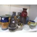 Royal Doulton stoneware to include a pair of vases, a three handled vase and a series ware jug