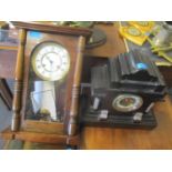A Victorian black marble cased mantle clock and a modern mahogany case regulator style clock