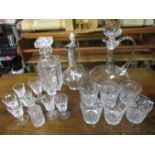 Glassware to include decanters, a claret jug and glasses