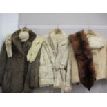 A vintage red fox stole, mixed artic rabbit purses and evening bags, along with three fur jackets,