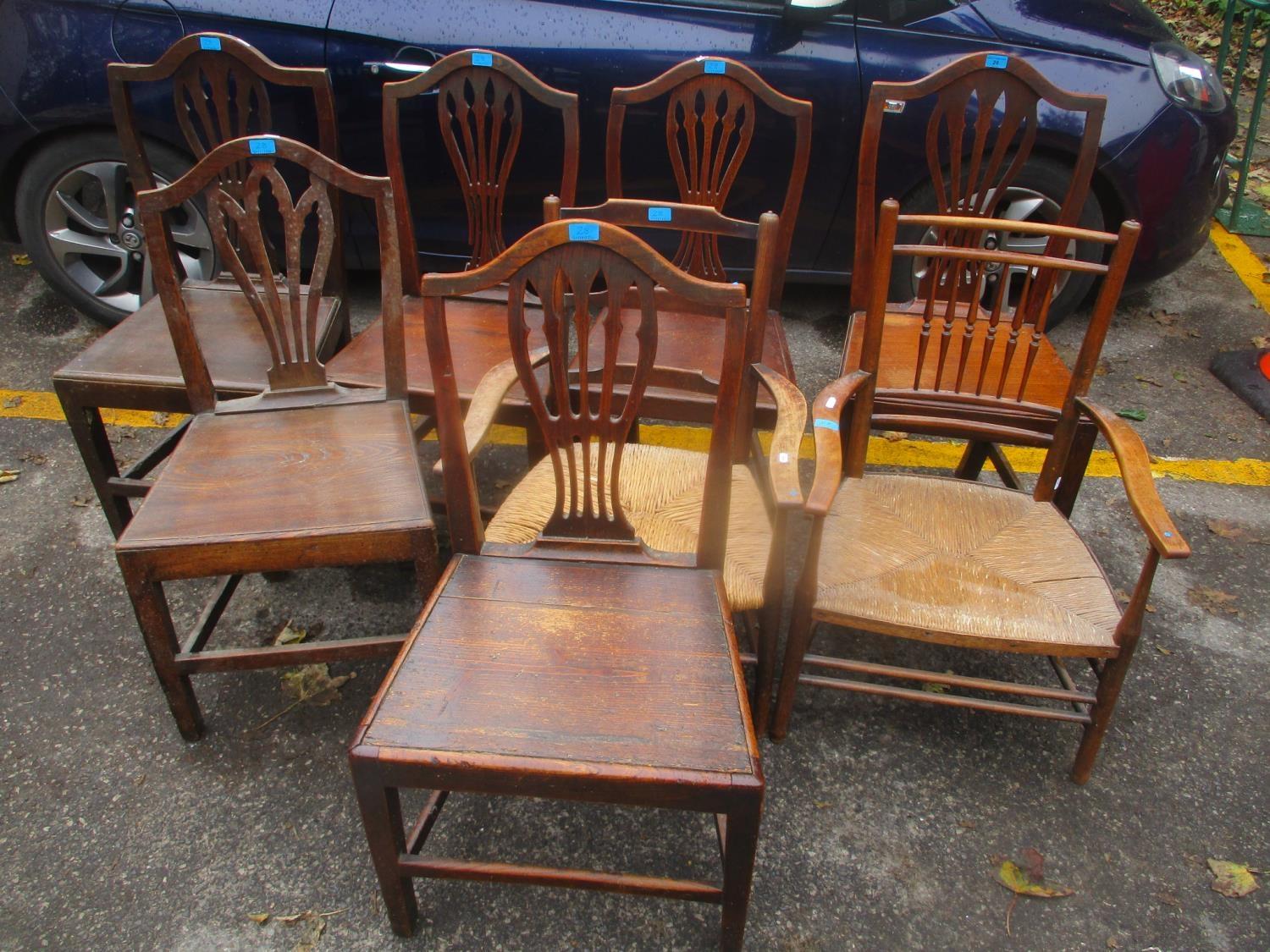 Mixed dining chairs to include a set of Georgian oak Hepplewhite style chairs