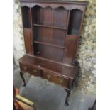 A 20th century George III design oak dresser with a plate rack, over two drawers, on cabriole