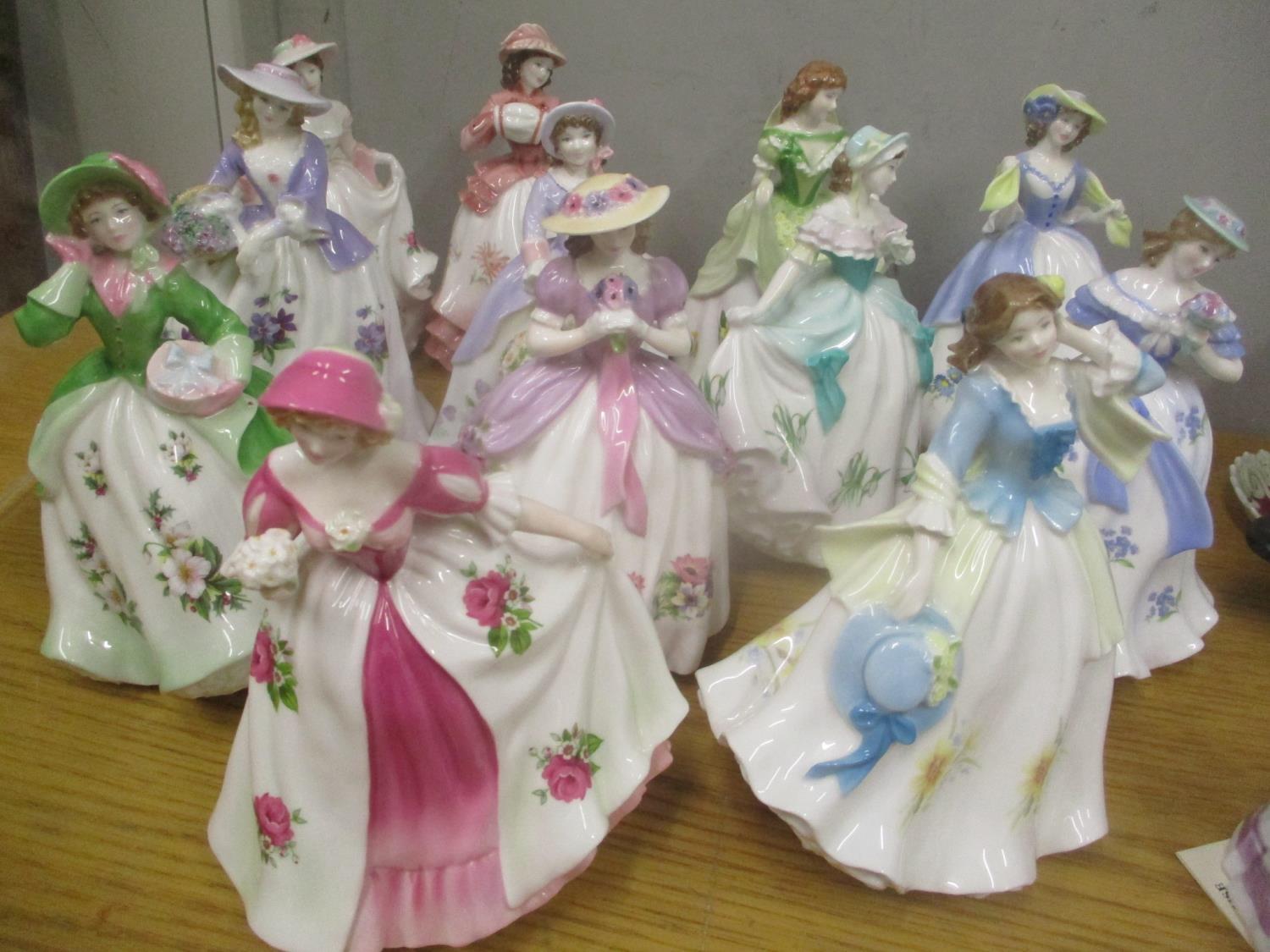 A selection of Royal Worcester lady figures to include Sweet Daffodil and others