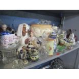 A mixed lot to include a silver plated, topped claret jug, Hummel figures, Capodimonte figure, two