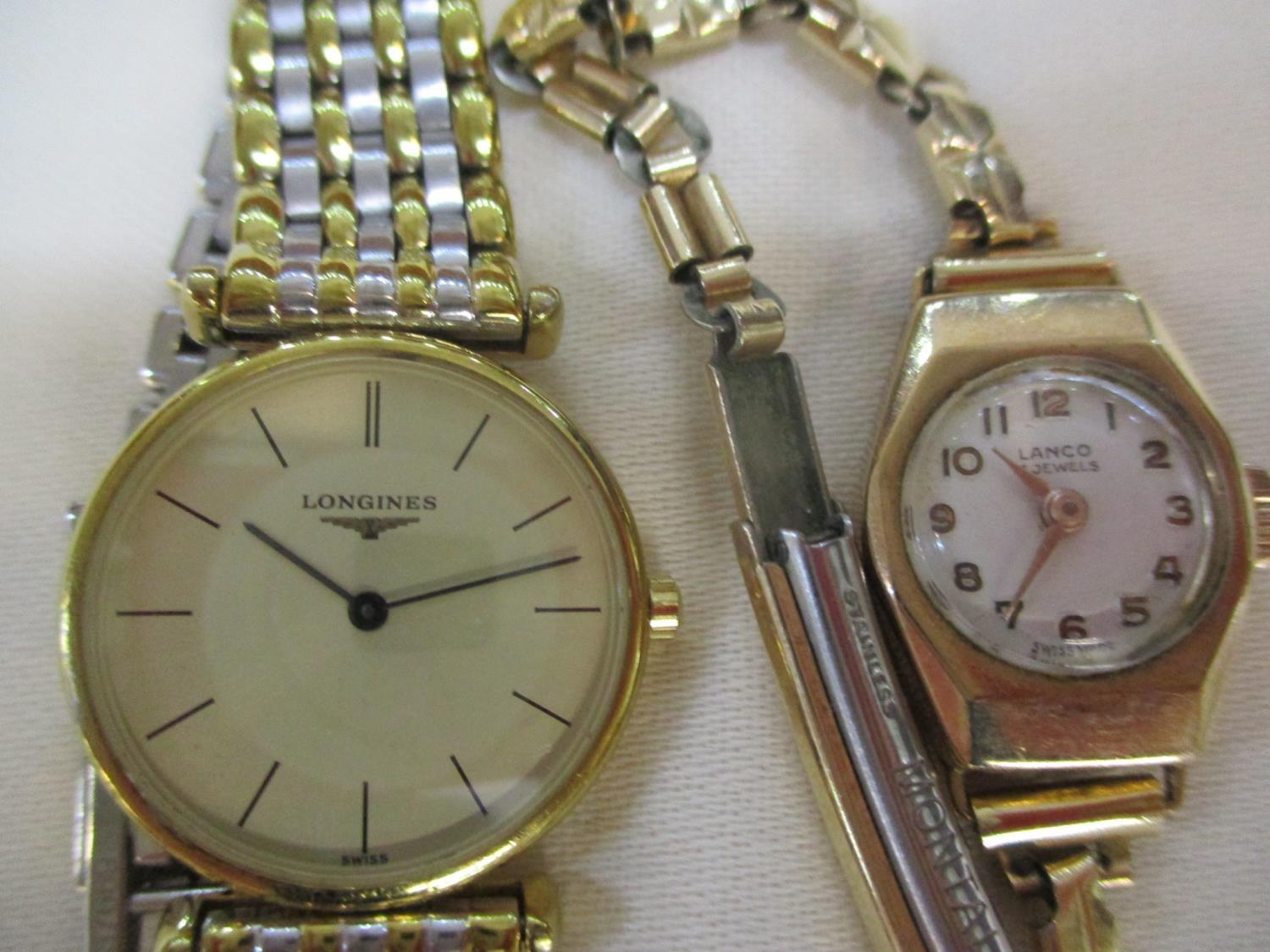 A Longines ladies wristwatch, together with a 9ct gold ladies cocktail watch