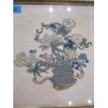 A framed and glazed Chinese cut out embroidery picture of a vase of flowers