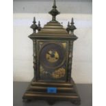 A late 19th century brass cased mantle clock with gilt ornament