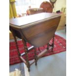 A 1930s oak gate leg table on barleytwist legs, 76cm w