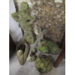 A garden composition statue, together with garden animal ornaments to include a planter in the
