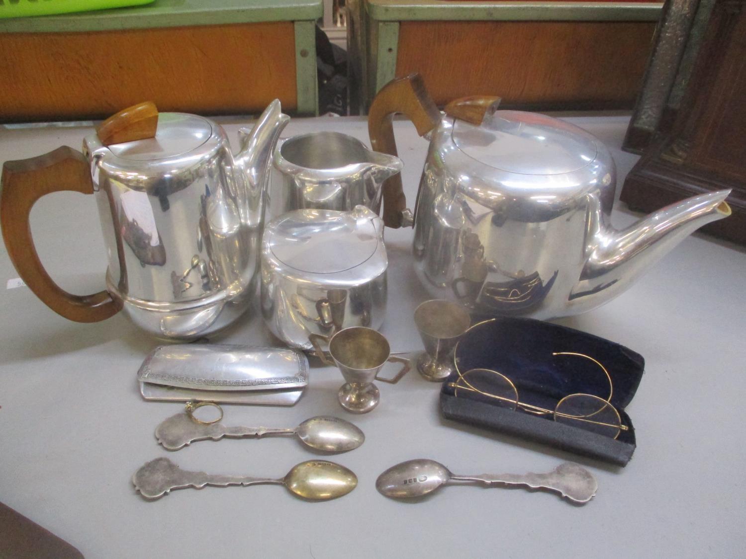 A mixed lot to include a Picquot ware four piece tea and coffee service, a 9ct gold opal set ring,