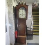 A George III eight day longcase clock with cross banded decoration and painted dial 225cm high
