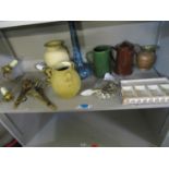 A mixed lot to include a pair of brass rams head side lights, pottery vases, enamel jugs and other
