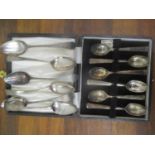 A set of six Georgian silver teaspoons, together with a set of cased silver coffee spoons, 127.85g