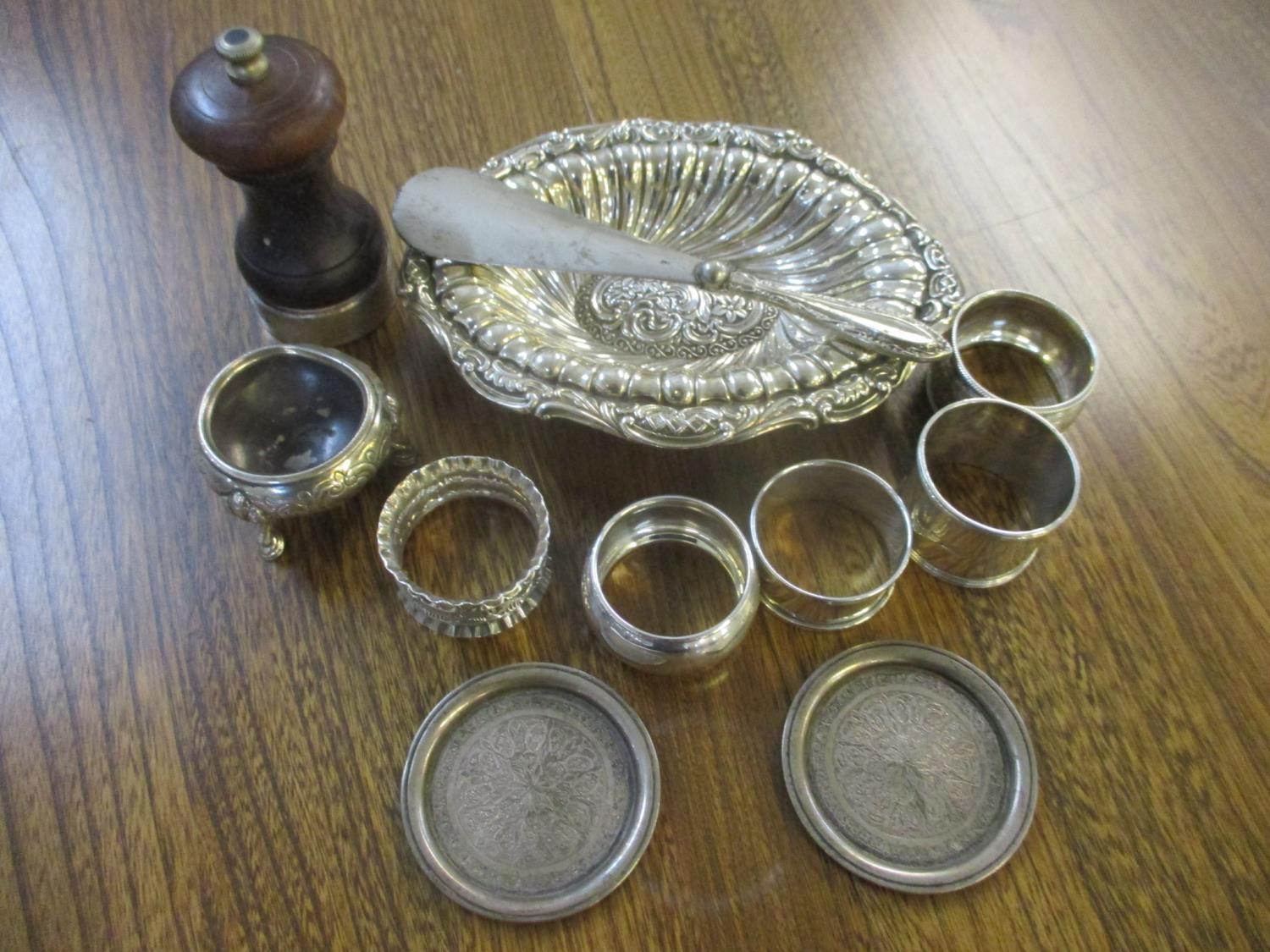 Mixed silver items to include napkin rings, tray, together with two white metal small saucers and