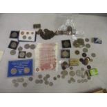 British banknotes and coins to include ten shilling notes, shillings, pennies, commemorative and