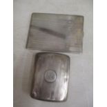 Two early 20th century silver cigarette cases, 241.75g