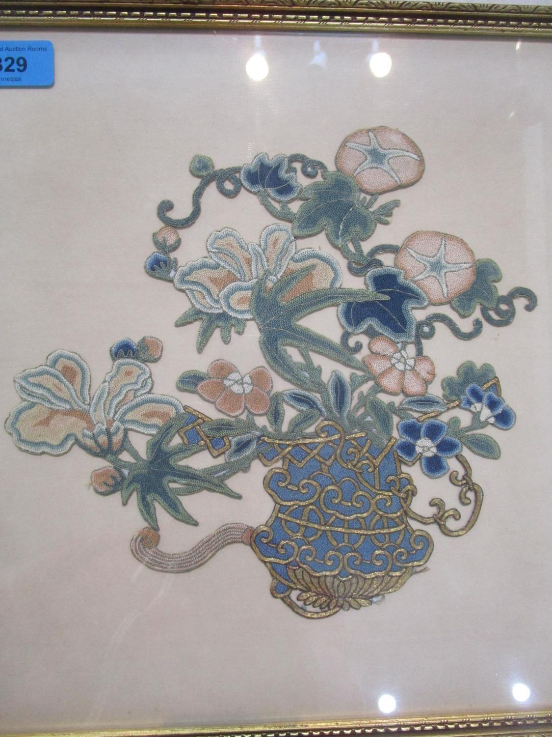 A framed and glazed Chinese cut out embroidery picture of a vase of flowers Location: LWM