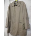 A Burberry gents rain mac in tan with iconic tartan lining, size 48" chest (122cm) x 35" long (88cm)