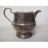 An early 20th century silver milk jug, 130.7g