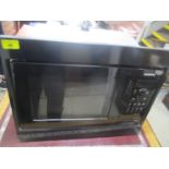 A Siemens microwave oven, brand new with handbook