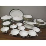 A Royal Worcester Cavendish leather green pattern china dinner service