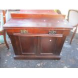 A late 19th/early 20th century mahogany chiffonier having a single drawer above two cupboards 92cm h