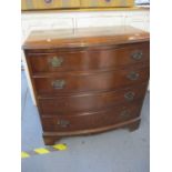 A late 19th century mahogany bowed chest of four drawers