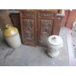 A pair of Chinese carved wall hanging mirrors, together with a stoneware flagon and a Lipscombe & Co