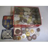 A mixed lot of coins and badges to include 1940s Athletics Club badges and others