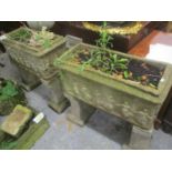 A pair of garden composition stone trough planters, raised on stands, 72h x 72.5cm w