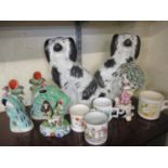 A pair of Staffordshire models of dogs, Staffordshire figures and Coronation mugs, together with