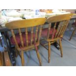 A refectory style table and a set of four chairs