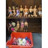 Seven 1990's/2000's Mattel Ken dolls and six Barbie dolls along with clothing accessories